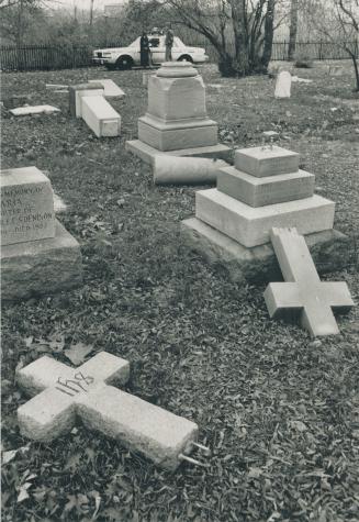 Vandals topple 90 gravestones. Granite and marble headstones lie toppled in the private Denison family cemetery at Denison and Clouston Aves. in the C(...)