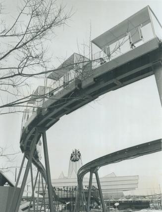 Impressed by Expo 67 where he and a City Council party are touring today, Mayor William Dennison wants a Toronto minirail joining the Canadian National Exhibition (CNE)