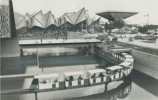 Workmen were bustling around Expo site today, getting everything in readiness for official opening this afternoon and streams of ordinary visitors exp(...)