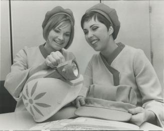 Hostesses Mary Hallam, left, and Diane Le Blanc