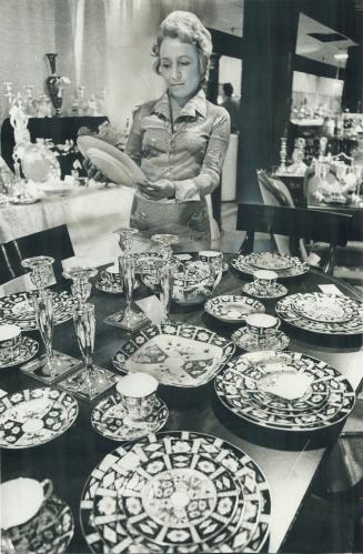 Shirley Butterworth admires an early Crown Derby dinner set for 8