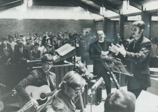 Rock of ages - and roll, too. There was no Bach and no organ prelude at Erindale United Church yesterday, Rev. Bob Clark, the minister, strummed a gui(...)