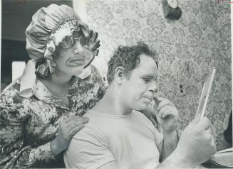 Billy the Clown, alias Bill Durtnall, demonstrates the art of putting on greasepaint for one of the 10 students from Edgar Adult Occupational Centre. (...)