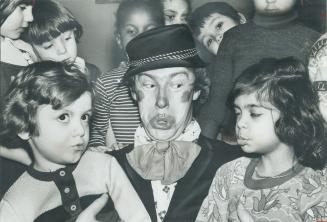 Former Moscow circus clown Valentine Gindin shows a couple of youngsters at Grenoble Public School in NorthYork how to pull a clown's face. But althou(...)