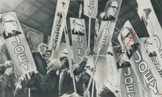 Today's the day when Newfoundland's Liberals decide the future of Joey Smallwood, at left, with supporters' placards all but engulfing him at the part(...)