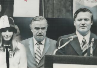 Retiring premier John Robarts (left), Jubilant successor William Davis