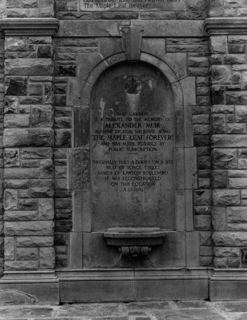 Image shows Alexander Muir and Alexander Muir Memorial Garden plaque, Yonge Street, east side,  ...