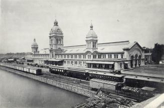 Image shows a view of the Union Station by the water.