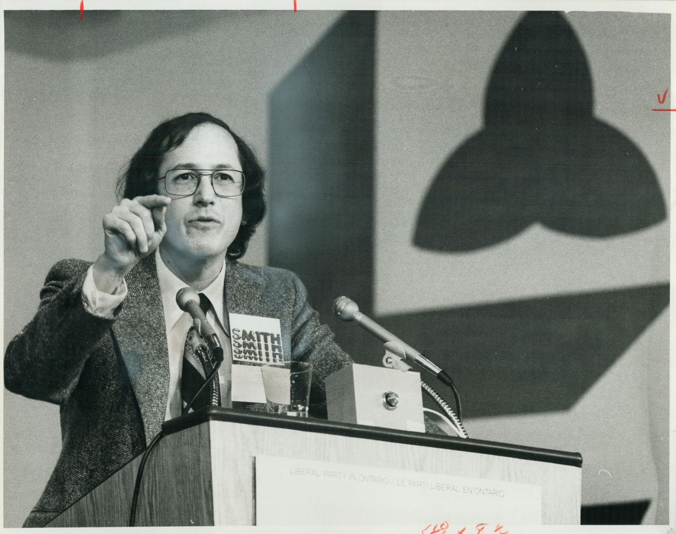 The new Ontario Liberal leader, Stuart Smith, makes his speech Saturday at the leadership convention (left)