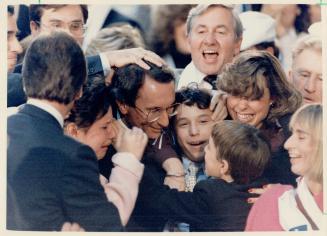New Tory leader Larry Grossman, celebrating with his family and supporters, had to overcome his city slicker image