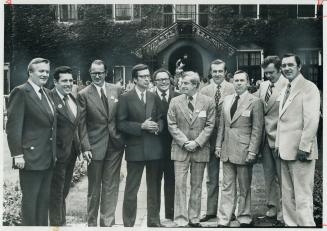 After a lunch break, nine premiers and a deputy line up outside hall on York University's Glendon campus