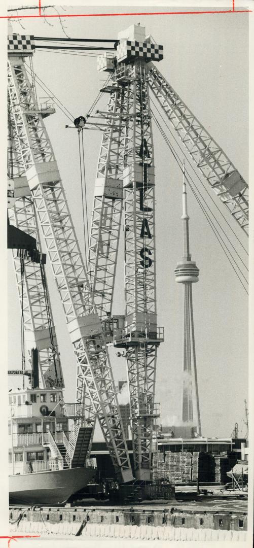 . . 2 . . 1 . . Lifttoff! No, No, the CN Tower is not headed for space, with vapor spewing from its base. It is framed on a cold day by the 300-ton he(...)
