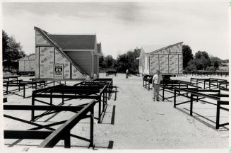 Ready-Made: Finished sections wait outside (above) while walls undergo construction inside the Wingham factory of Royal Homes