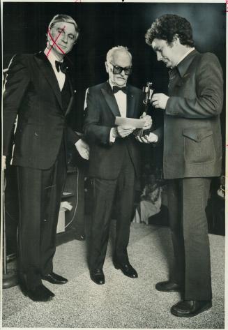 Darryl Zanuck (Left) Rewards Claude Jutra, Jutra won 8 of 12 awards but his film hasn't been seen in Quebec