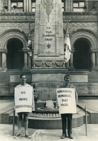 Ban-bombers recall Hiroshima. Ron Roebuck (left) and Art Ouellette stand vigil at the city hall cenotaph as Toronto Committee of 100 remembered 240,00(...)