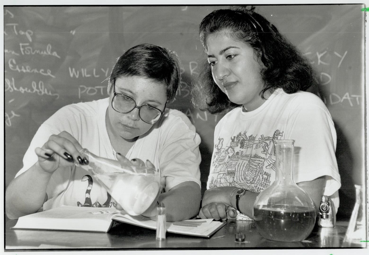 Litmus test: Deborah Baran, left, and Fariba Chelehmal work on their chemistry at Britannia Adult Education Centre, former vocational school now used by adult day students