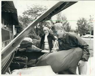 Loading up for trip to vermont are Mrs. Lorne Booth and her son, Donald, 18. He has dyslexia, a learning disorder that causes him to see words and fig(...)