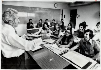 200,000 People are expected to enrol in adult education courses this year, such as in the language class at George Brown College taught by Leo Satoor. [Incomplete]