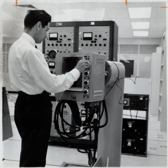 Automatic pilot of revolutionary kind, this gyroscopic apparatus is balanced by Peter Coward at Dixon Rd
