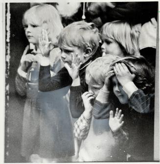 Gee, what awful table manners!, A group of children who came to the Metro Zoo to wish gorillas Tabitha and Natasha bon voyage yesterday are engrossed (...)