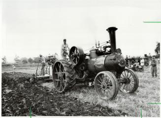A farm festival: Sherwood Hume drives a 1913 Sawyer-Massey Steam traction engine