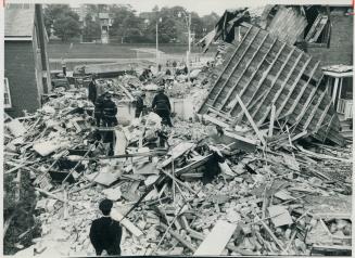 Shattered by Explosion, wreckage of two Keele St