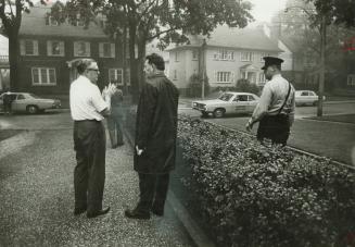 Talking with investigator, Hawker Siddeley executive William Boggs(left) tells Det