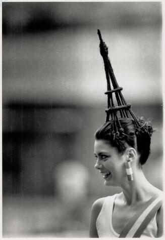 Towering hair: Left, Eiffel Tower hairdo on Corrina Clarke was created by Tasso Gliatis of Haute Coiffure ManuLife Centre from a mix of real and synthetic hair wound around florist's wire