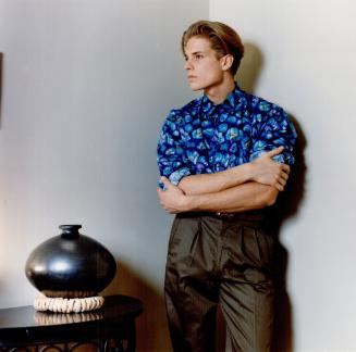 Left, Paul Smith's bright fig print shirt, $165, and olive pant, part of a suit, $635, all from Holt Renfrew