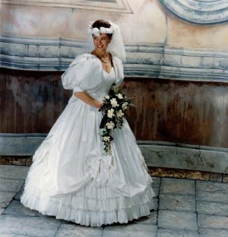 Modern romance: Silk gown with cotton lace hem and tulle crinoline, $4,000, Valencienne, headpiece, Valencienne, jewelry, OLiver Jewellers