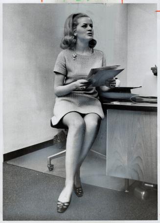 Civil Rights laws have allowed ofice girls such as Rennee Sandholm to hoist hemlines