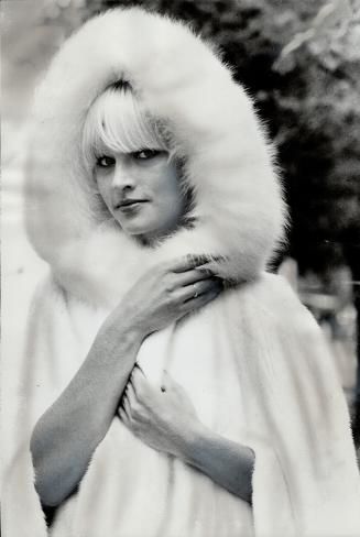 Long hooded white mink cape, It was designed by Marc Bohan for Christian Dior