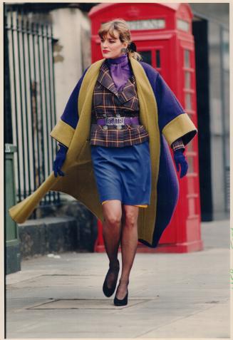 Right, Blair's double-faced wool coat with kimono colar over tartan jacket and slim skirt