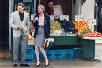 Below, she wears B. Scene's top, $34.95, and skirt $44.95, cotton jacket, $89.95. He wears Michael Tong's linen jacket, $259, trousers, $179, both fro(...)
