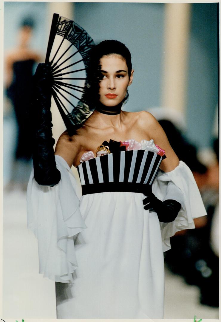 Different looks: Left, from designer Karl Lagerfeld's spring/summer '88 collection for Chanel, and worn by his muse, Ines de la Fressange, a sporty skirt and blouse