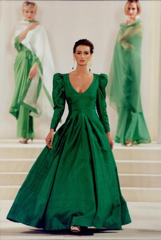Top, a green taffeta ball gown from his spring line showsScaasi's specialty -- the fairy tale dress with a flattering neckline