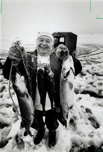 World class: As goodwill ambassador for Town of Georgina's Ice fishing derby, Charlie Johnson has seen some beauties pulled from Lake Simcoe