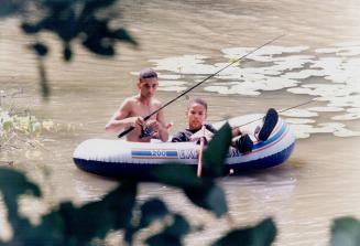 Ritchie Browne, 14, left, and brother Waymon, 11 Rouge River