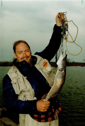 7-Pound pike: Ernie Vargo of Pickering gets early start in fishing season by landing pike at Frenchman's Bay last week