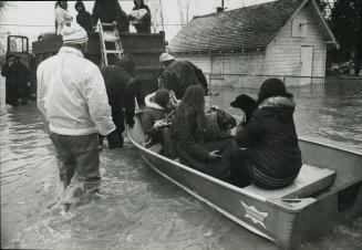 Residents leave for higher ground, More than 85 familys on one street alone had to fle their homes in the wake fo flood waters from Lake St. Clair