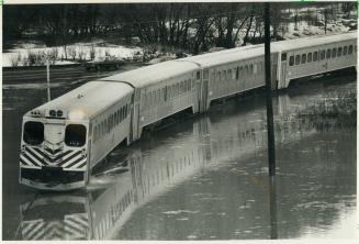 All at sea: This GO train looked more like some amphibious vehicle when it ran into a flooded section of track in the Don Valley this morning