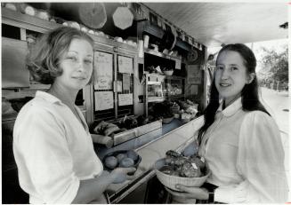 The wholesome wagon: Paula Fisher (left) and Julie Caplin sell healthy alternatives to the usual catering truck fare from their mobile canteen they call The Movable Feast