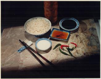 Five basic ingredients - (clockwise from top left) plain white rice, fish sauce, soy sauce, chilies and coconut milk - give you a passport to Asian cuisine
