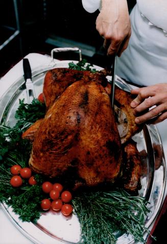 2. Split skin. Start with the turkey legs. Using a carving knife, split the skin between the leg and breast