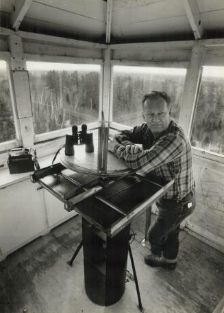 Where there's smoke: Jim Clouthier Climbs the fire tower at Petawawa every day to begin his solitary job looking for forest fires