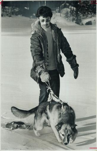 Checking his traps, Cree trapper Allan Diamond, 25, snowshoes on Tukanee Lake, north of Sault Ste
