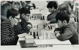 Concentrating intensely on their boards, a group of youngsters compete in the Toronto public school chess finals at Bloor Collegiate on Saturday. More(...)