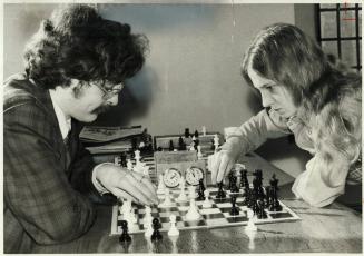 Perfect mates, Lawrence and Angela Day play chess at U of T Chess Club