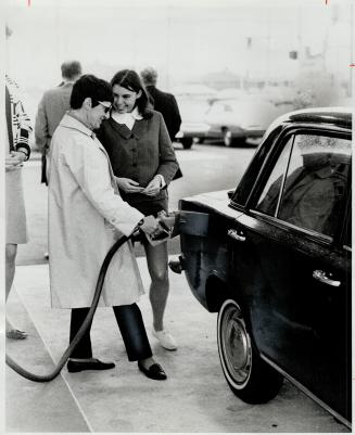 First self-service gas station, Customer Mrs