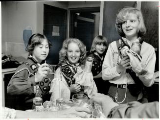 Happy gang: Anne-Marie Von Zuben (centre) helps wash up with fellow Guides Tammy Hand, 13, (left) and Donna Sutton, 14